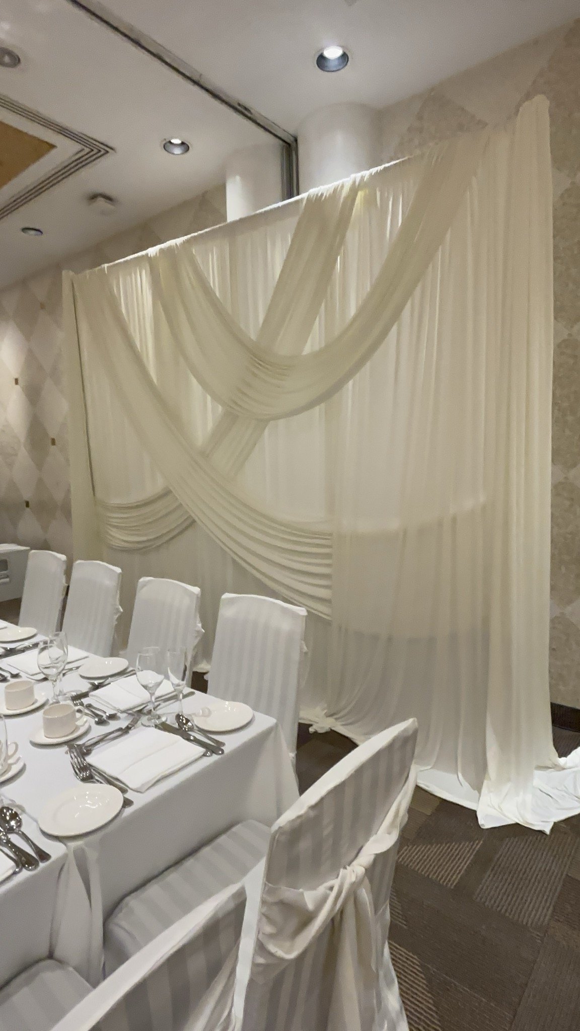 Ivory drape backdrop setup at a White Oaks wedding in Niagara - Rent Party Shop