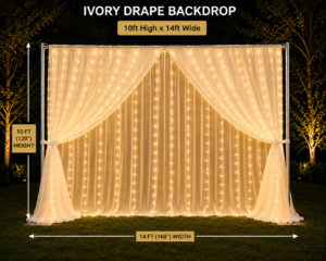 10ft high x 14ft wide ivory drape backdrop with string lights