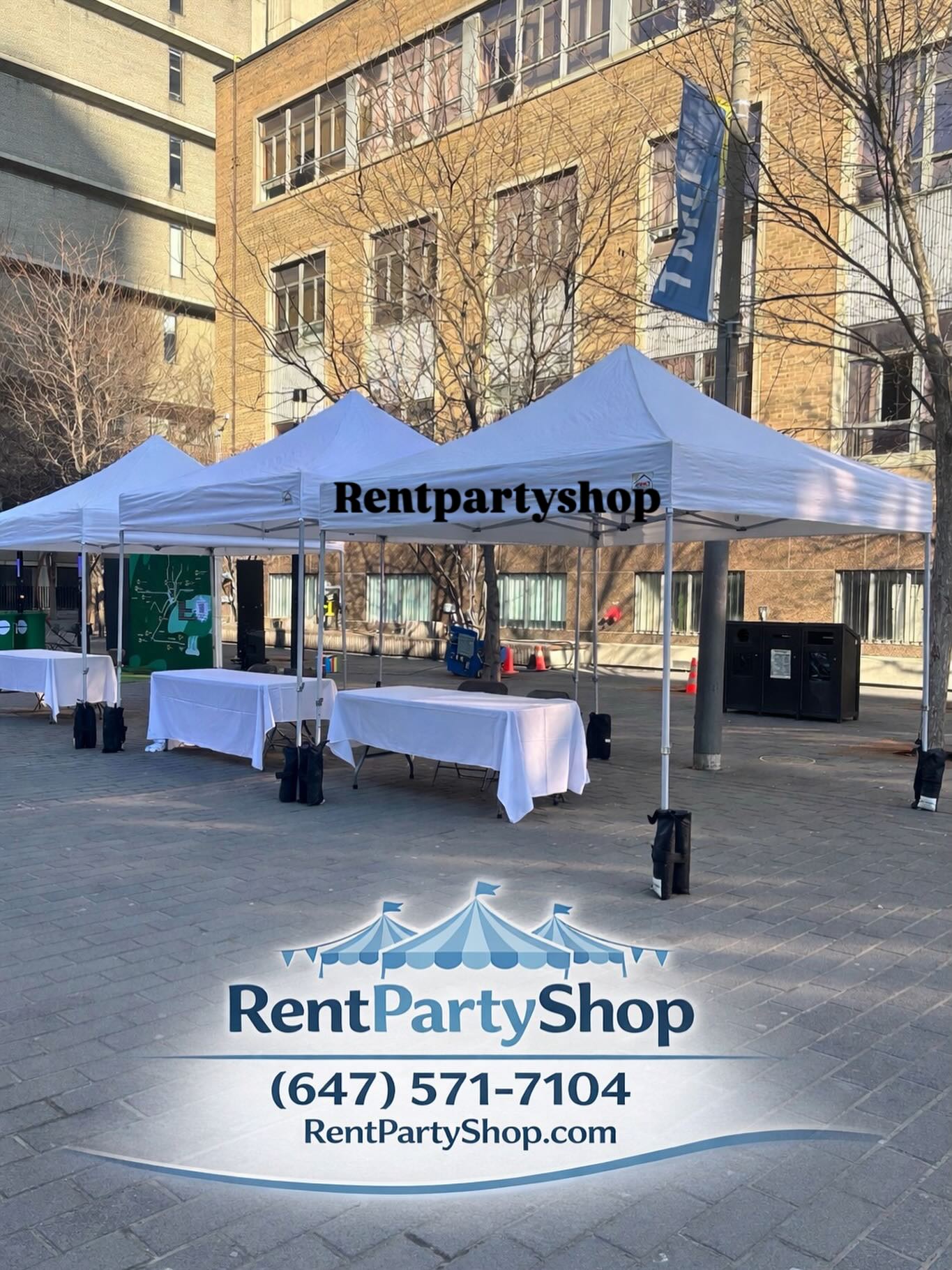 Pop-up tents secured with professional weight bags in the Niagara Region